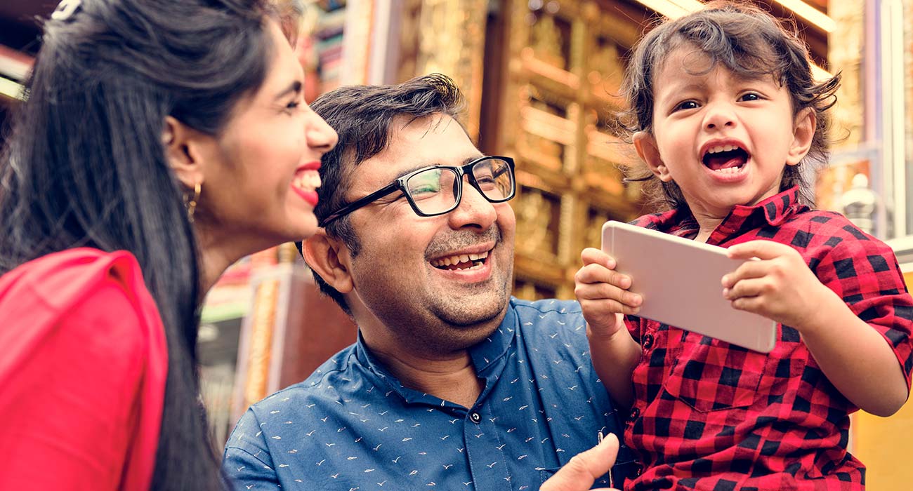 Parents and grandparents reviewing Canadian Super Visa and family sponsorship options with immigration documents